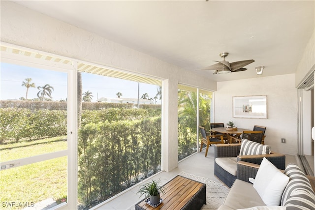 sunroom / solarium with ceiling fan