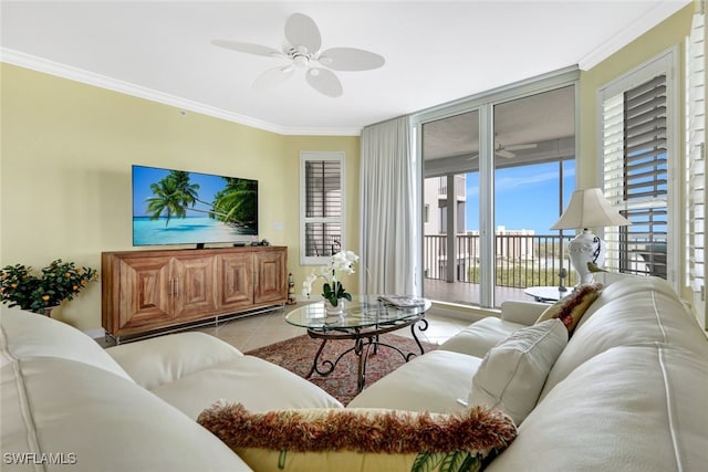 living room with crown molding, light tile patterned floors, and ceiling fan