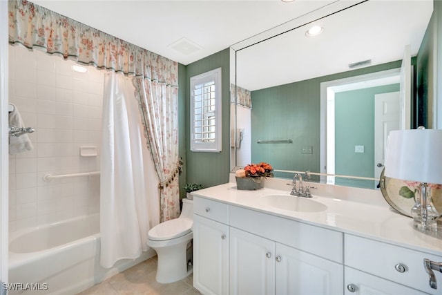 full bathroom with toilet, shower / tub combo, vanity, and tile patterned floors