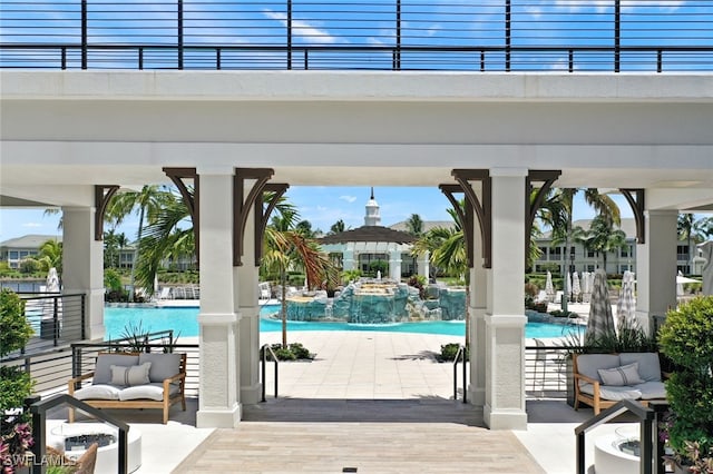 view of swimming pool with a patio