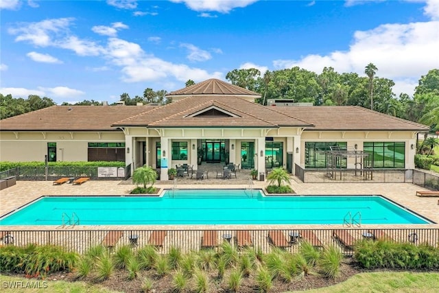 580 El Camino Real Unit 3201, Naples, FL 34119 - community pool featuring a patio