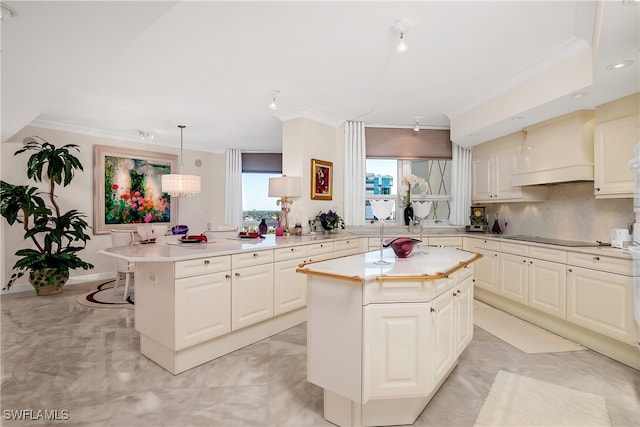 kitchen with a center island, tasteful backsplash, decorative light fixtures, black electric cooktop, and custom exhaust hood