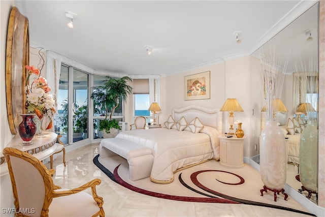 bedroom featuring access to outside and ornamental molding