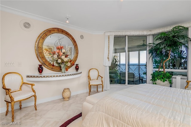 bedroom with a water view, ornamental molding, and access to outside