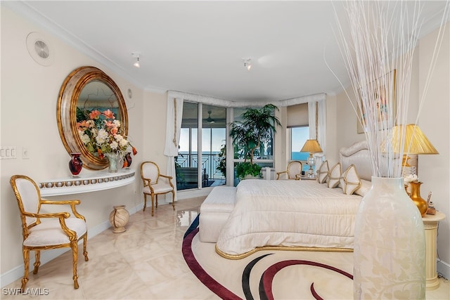 bedroom featuring access to exterior and crown molding