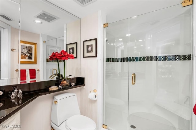 4021 Gulf Shore Blvd N Unit 903, Naples, FL 34103 - full bathroom featuring toilet, a shower stall, and vanity