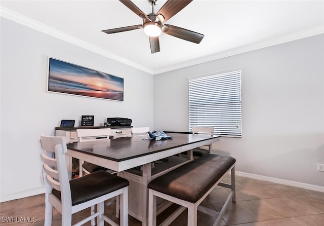 dining room featuring ceiling fan, crown molding, and light tile patterned flooring