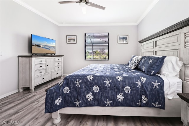 bedroom with ceiling fan, hardwood / wood-style floors, and ornamental molding