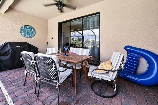 view of patio / terrace featuring a grill and ceiling fan