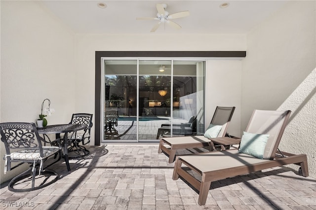 view of patio with ceiling fan