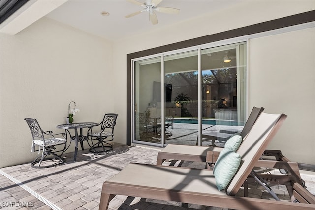 view of patio with ceiling fan