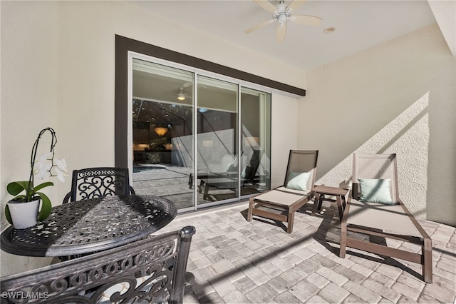 view of patio / terrace featuring ceiling fan