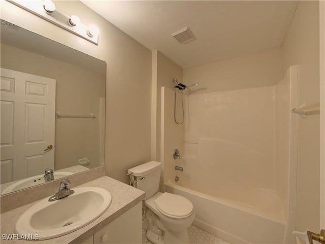 full bathroom featuring vanity, shower / bath combination, and toilet