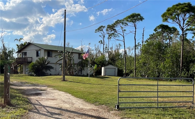 exterior space with an outbuilding and a garage