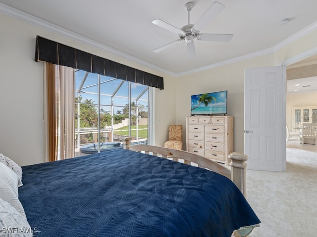 carpeted bedroom with access to outside, ceiling fan, and crown molding