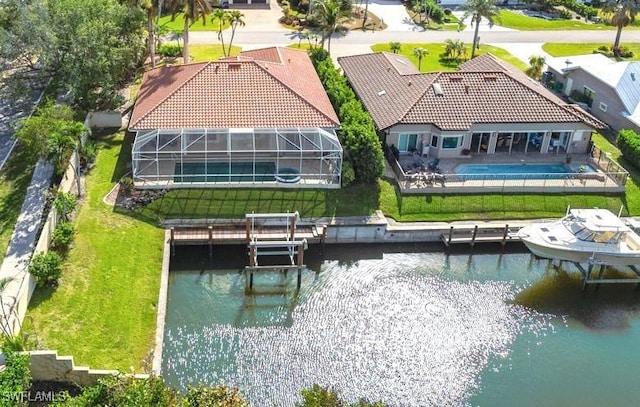 drone / aerial view featuring a water view