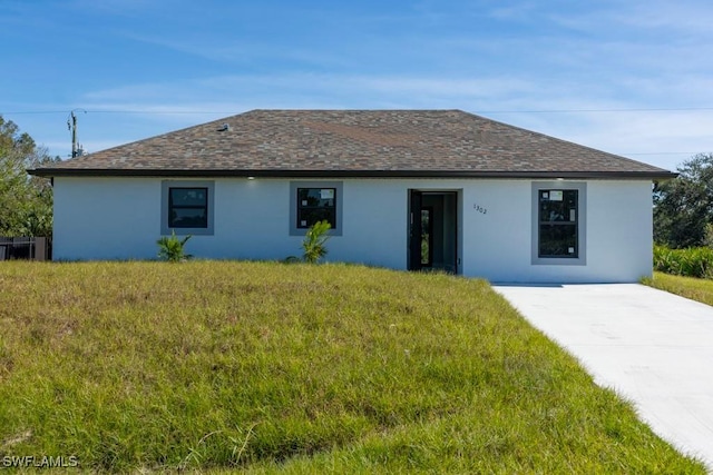 view of front of home with a front yard