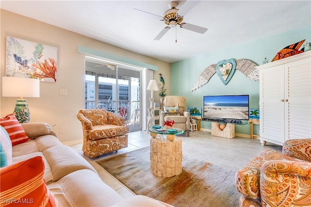 tiled living room featuring ceiling fan