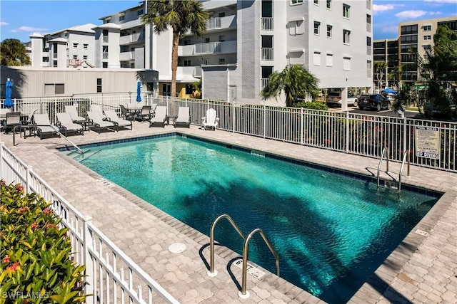 view of swimming pool featuring a patio