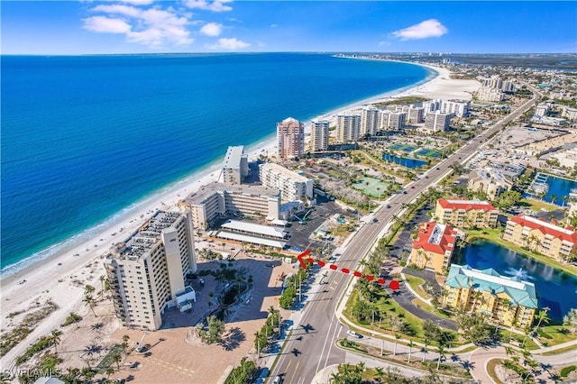 bird's eye view featuring a beach view and a water view