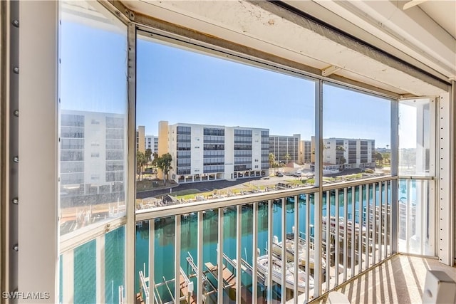 balcony featuring a water view