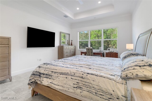 tiled bedroom with a raised ceiling and ornamental molding