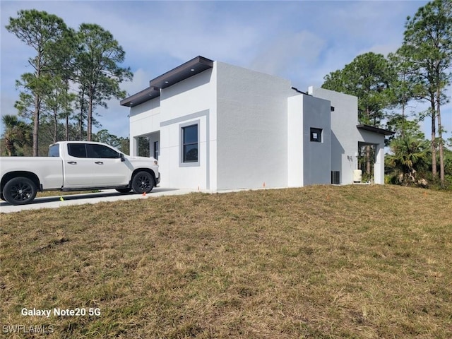 view of property exterior featuring a yard