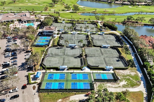 bird's eye view with a water view