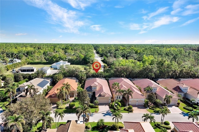 5620 Hammock Isles Dr, Naples, FL 34119 - aerial perspective of suburban area with a heavily wooded area