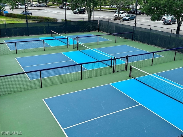 5620 Hammock Isles Dr, Naples, FL 34119 - view of tennis court with community basketball court