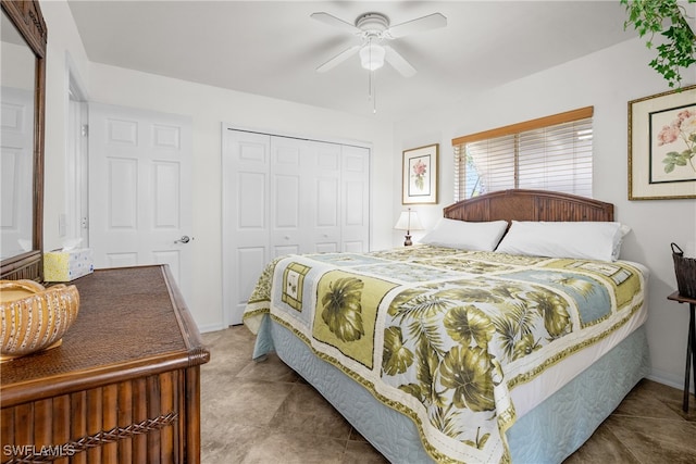 bedroom with ceiling fan and a closet