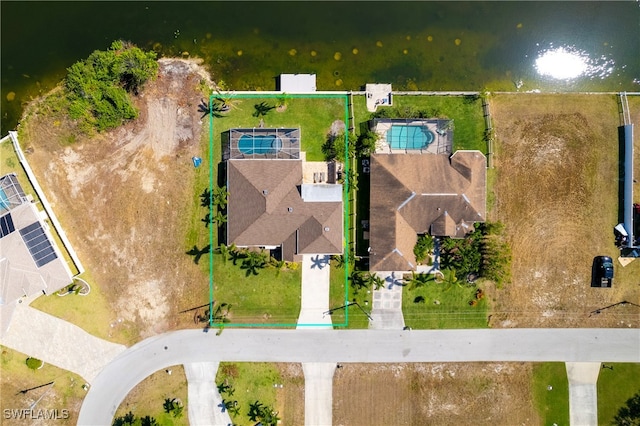 drone / aerial view featuring a water view