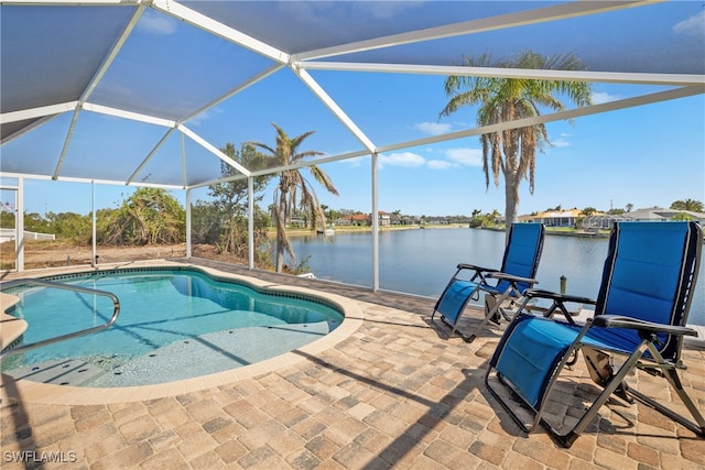 view of swimming pool featuring a patio, a water view, and a lanai