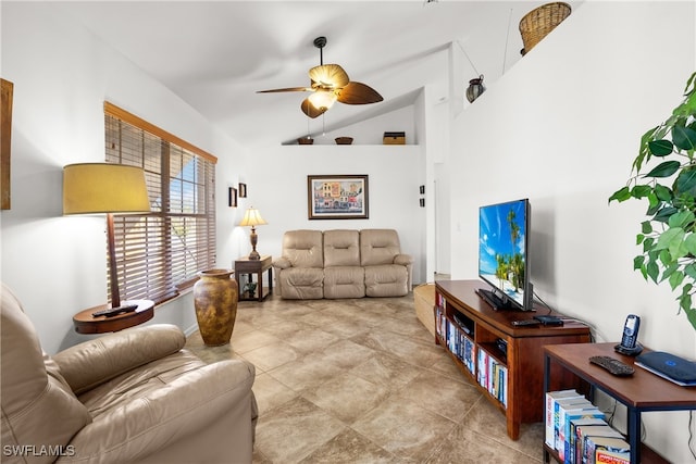 living room featuring ceiling fan and lofted ceiling