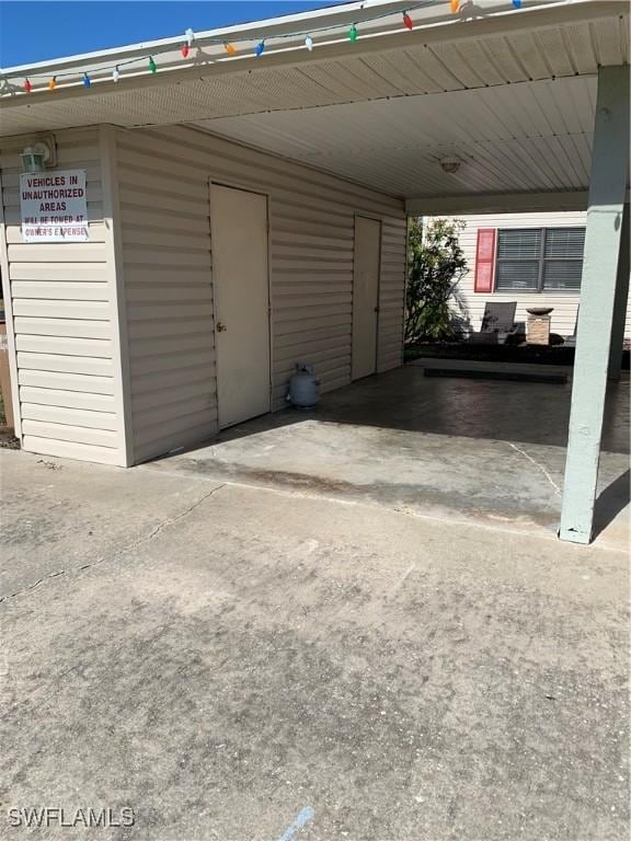 garage with a carport