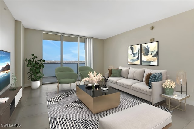 living room featuring tile patterned flooring, a water view, and a wall of windows