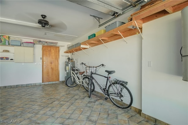 garage with ceiling fan and electric water heater