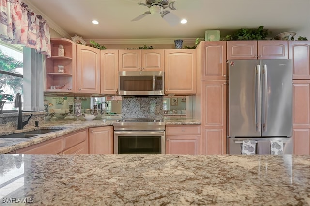 kitchen featuring crown molding, sink, appliances with stainless steel finishes, tasteful backsplash, and light stone counters