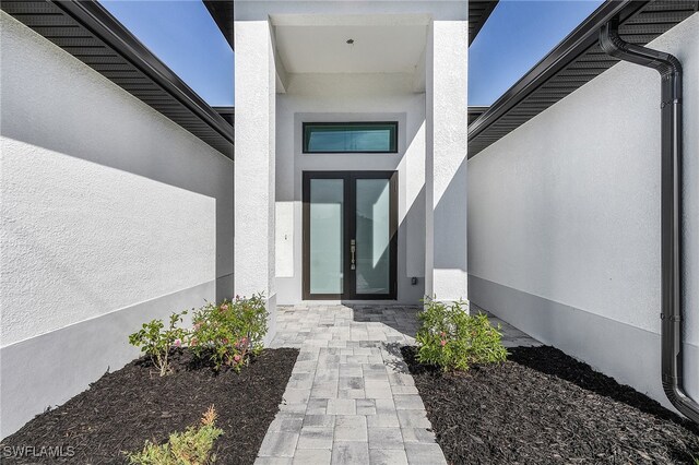 1517 SW 28th Ter, Cape Coral, FL 33914 - view of exterior entry featuring french doors