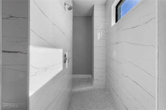 1517 SW 28th Ter, Cape Coral, FL 33914 - bathroom featuring a tile shower