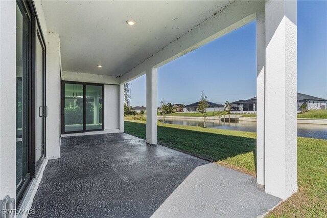 1517 SW 28th Ter, Cape Coral, FL 33914 - view of patio featuring a water view