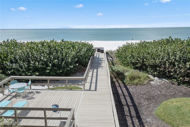 property view of water featuring a beach view