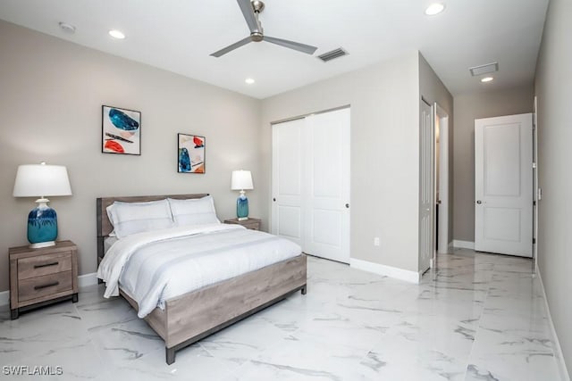 bedroom with baseboards, visible vents, marble finish floor, a closet, and recessed lighting