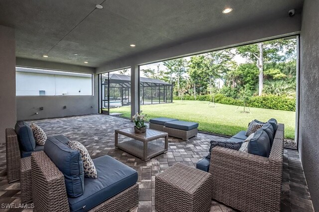 view of patio featuring a lanai and an outdoor hangout area