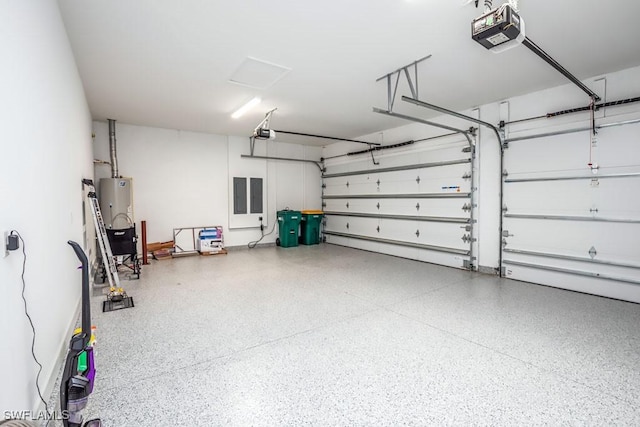 garage with gas water heater and a garage door opener