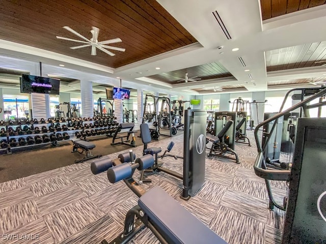 gym with ceiling fan, wooden ceiling, and carpet flooring