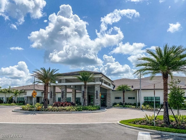 view of property featuring driveway