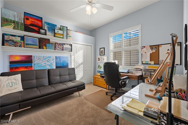 office area featuring carpet flooring and ceiling fan