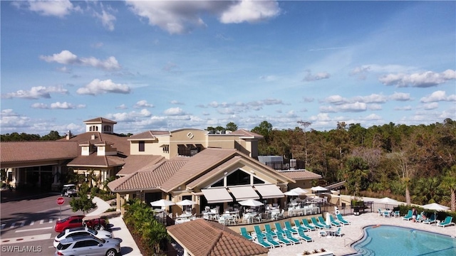 community pool featuring a patio