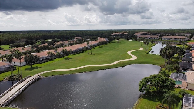 aerial view with a water view and golf course view